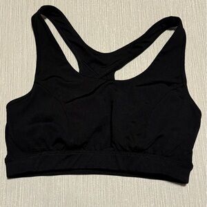 Medium Tek gear padded sports bra with open back eye hole